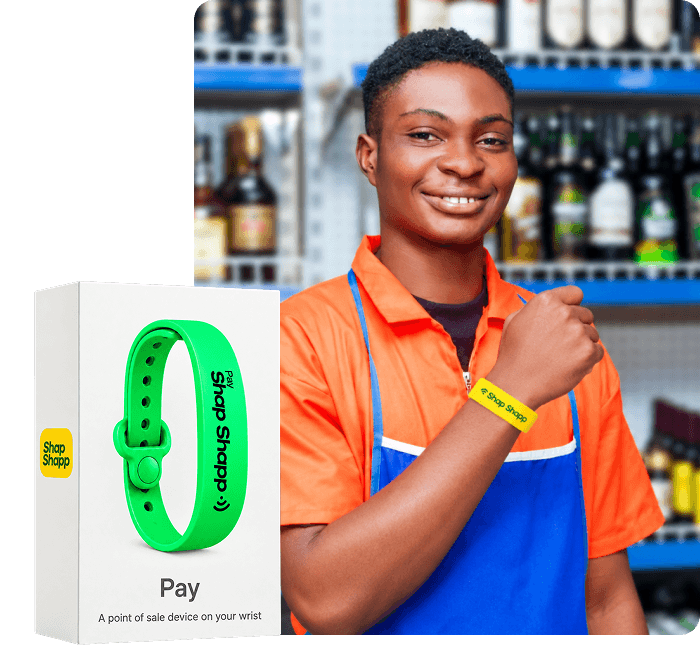 Store worker wearing a yellow Shap Shapp band beside the green Shap Band box