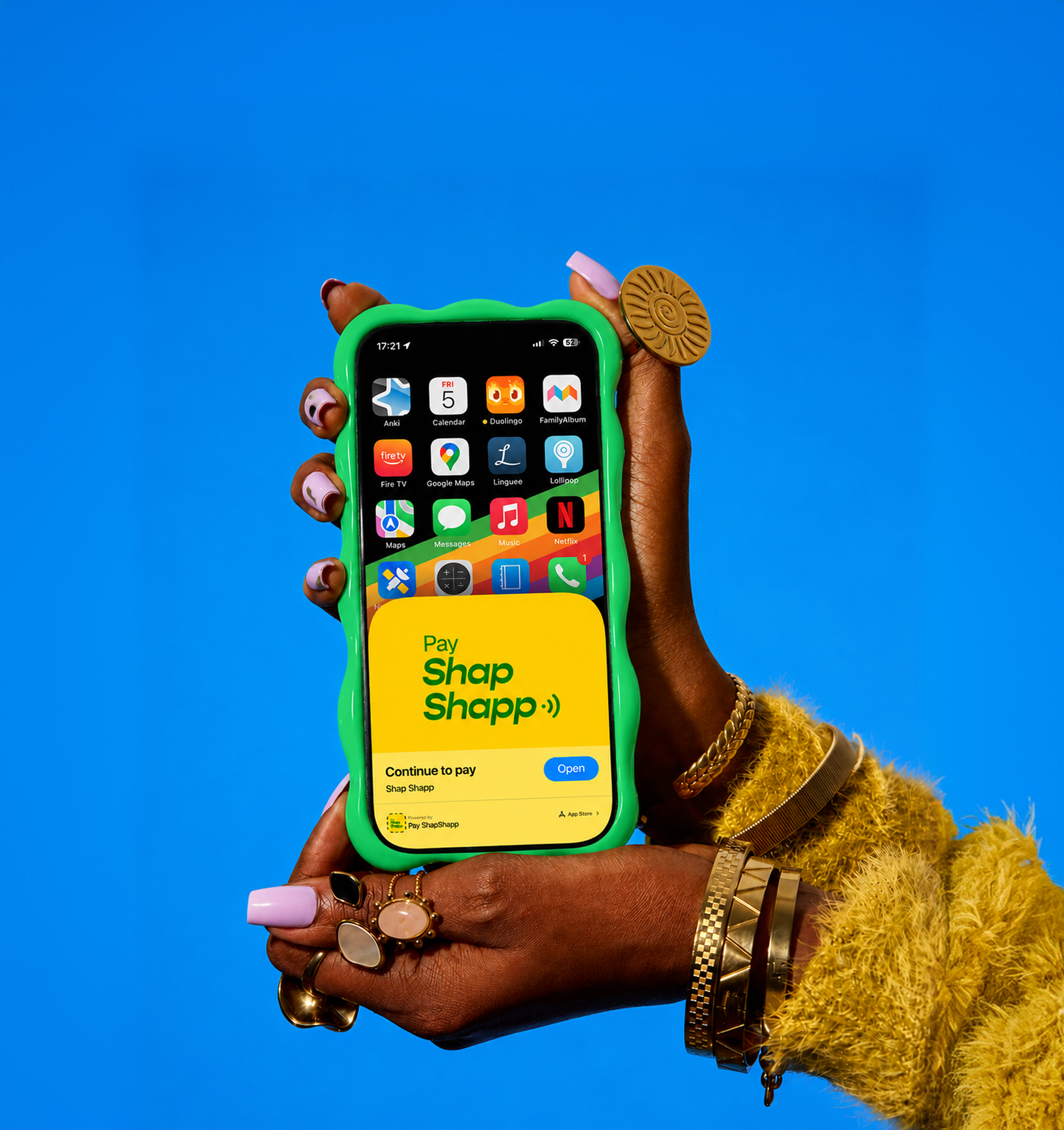 Hands holding a phone showing a Pay Shap Shapp app clip
